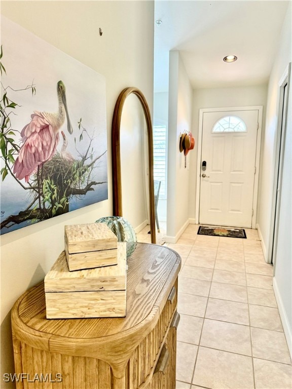 entrance foyer featuring light tile patterned floors