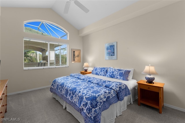 carpeted bedroom with vaulted ceiling and ceiling fan