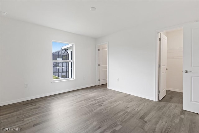 interior space with dark hardwood / wood-style flooring