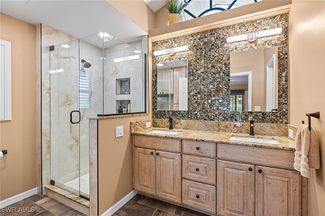 bathroom with vanity and an enclosed shower