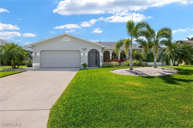 ranch-style home featuring a front yard and a garage