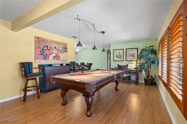 rec room featuring beamed ceiling, light hardwood / wood-style floors, and billiards