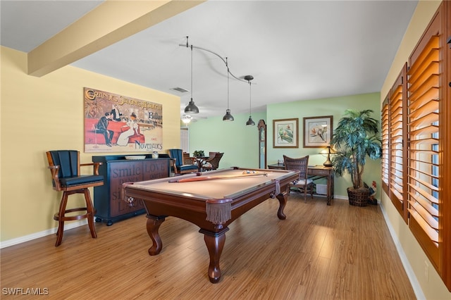 game room with beam ceiling, pool table, and light hardwood / wood-style floors