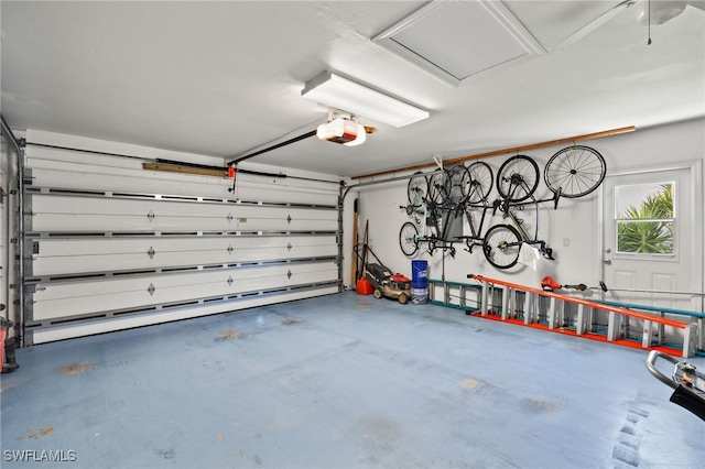 garage featuring a garage door opener