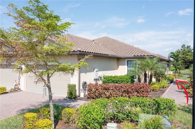 view of front of home with a garage