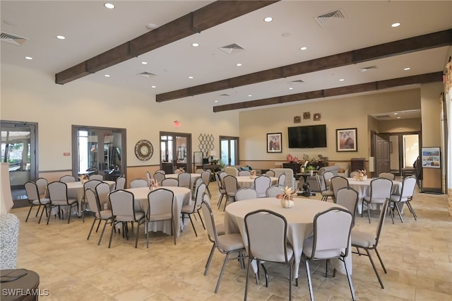 dining room featuring beam ceiling