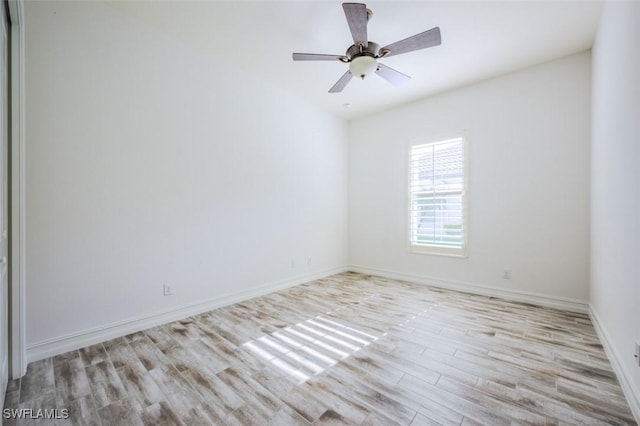 spare room with ceiling fan and light hardwood / wood-style flooring