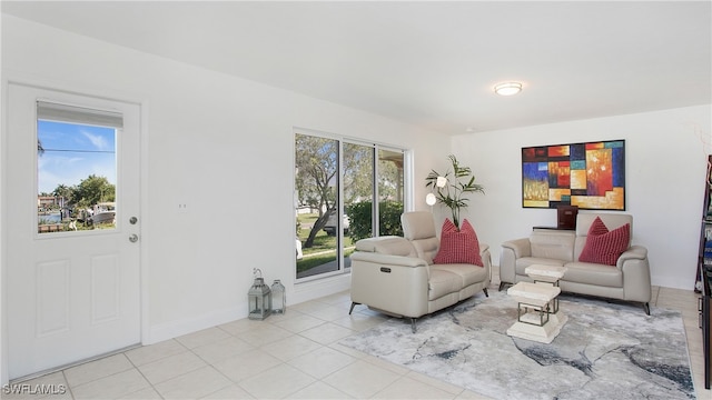 tiled living room featuring plenty of natural light