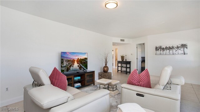 living room featuring light tile patterned floors