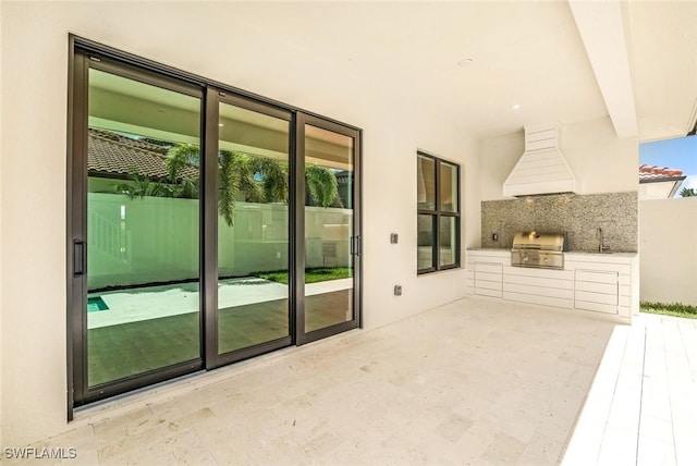 exterior space featuring plenty of natural light and sink