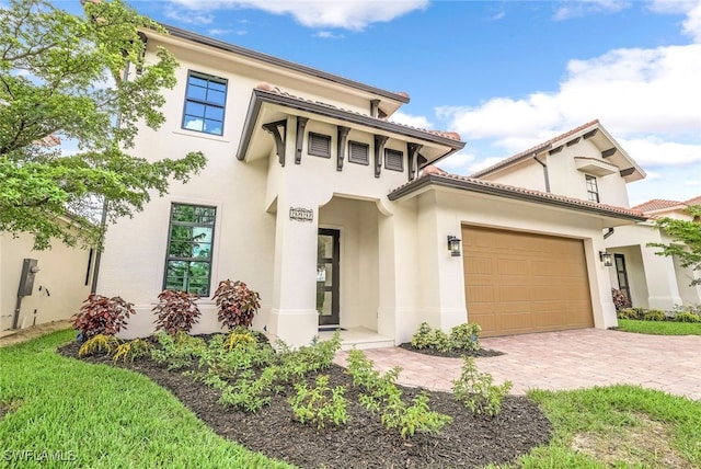 view of front of home with a garage