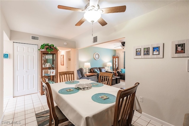 dining area featuring light tile patterned flooring and ceiling fan