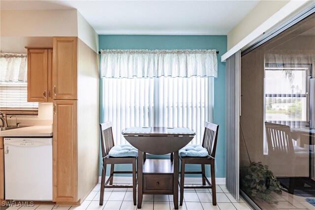 dining room with light tile patterned flooring