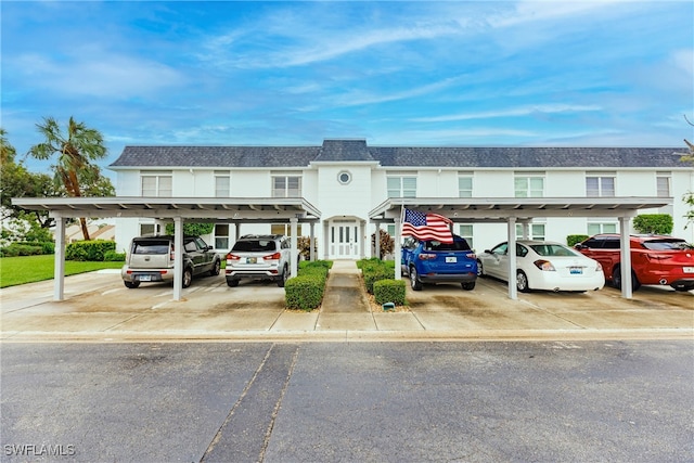 view of property featuring a carport