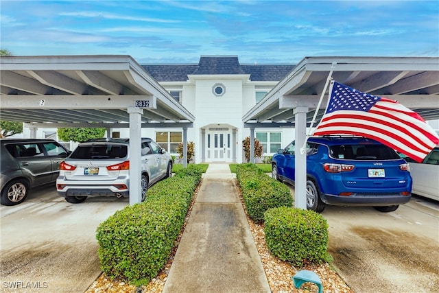 exterior space featuring a carport