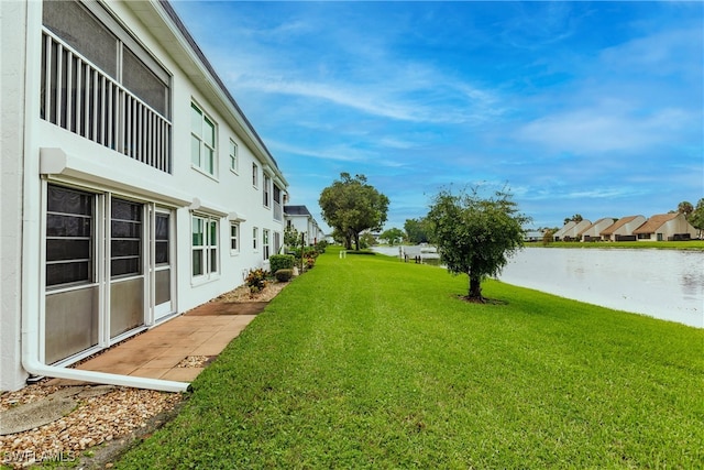 view of yard with a water view