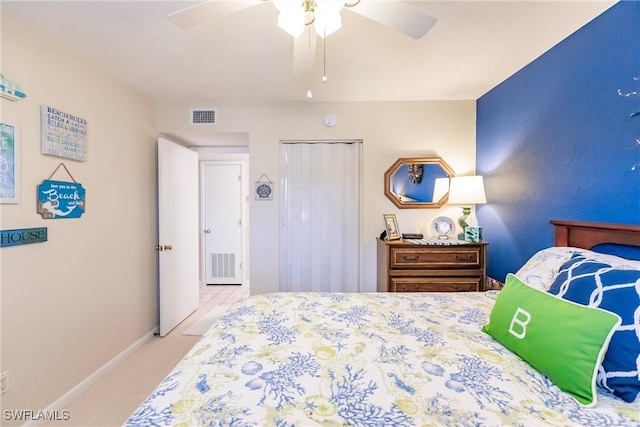 carpeted bedroom featuring ceiling fan