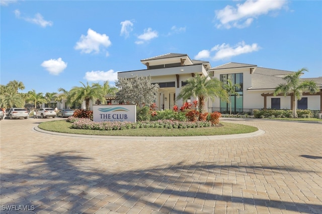 295 Grande Way Unit 1004, Naples, FL 34110 - community sign featuring curved driveway