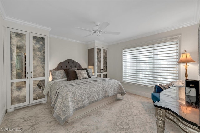 bedroom featuring ornamental molding, ceiling fan, and french doors