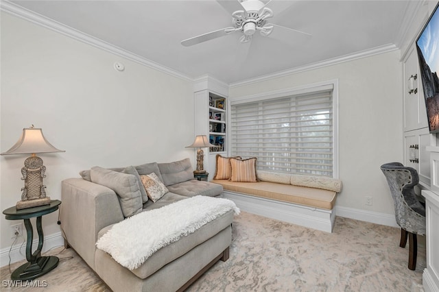 living room with ceiling fan, ornamental molding, and a wealth of natural light