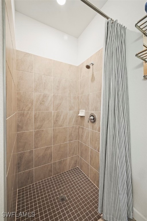 bathroom featuring a stall shower