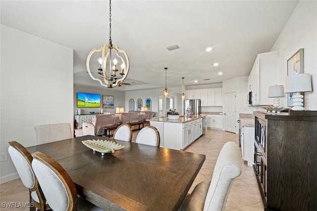 dining space featuring light tile patterned floors, baseboards, visible vents, a notable chandelier, and recessed lighting