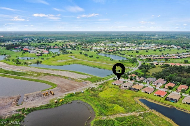 aerial view featuring a residential view and a water view