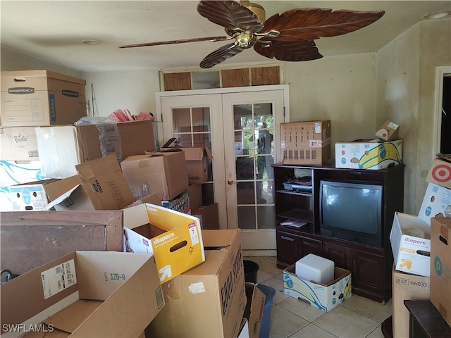 storage area featuring french doors and ceiling fan