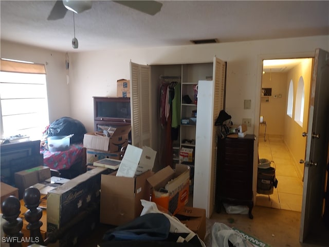 bedroom featuring a closet and ceiling fan