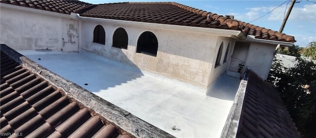 view of home's exterior with a patio