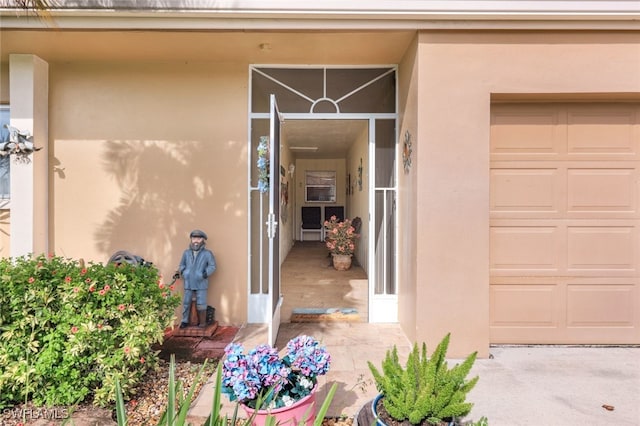 entrance to property with a garage