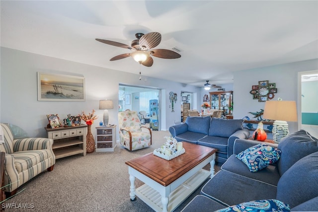 living room with carpet and ceiling fan