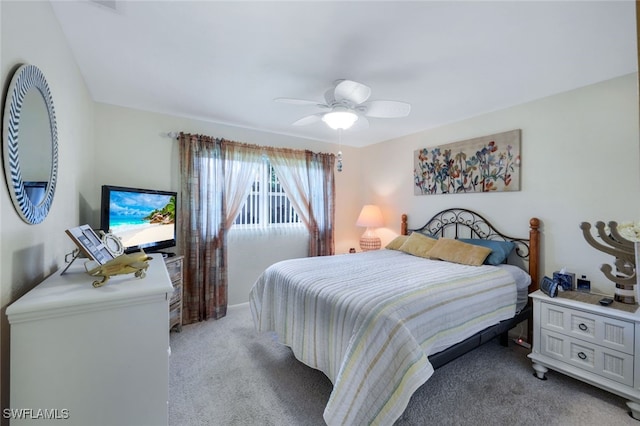 bedroom featuring ceiling fan and light colored carpet