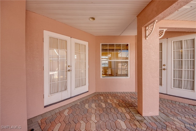 doorway to property featuring french doors