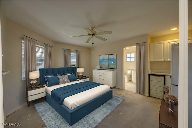 bedroom with connected bathroom and ceiling fan