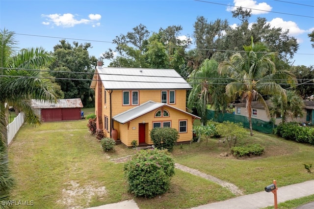 view of front of home with a front yard