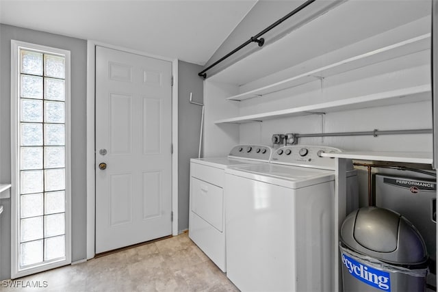 laundry room with separate washer and dryer