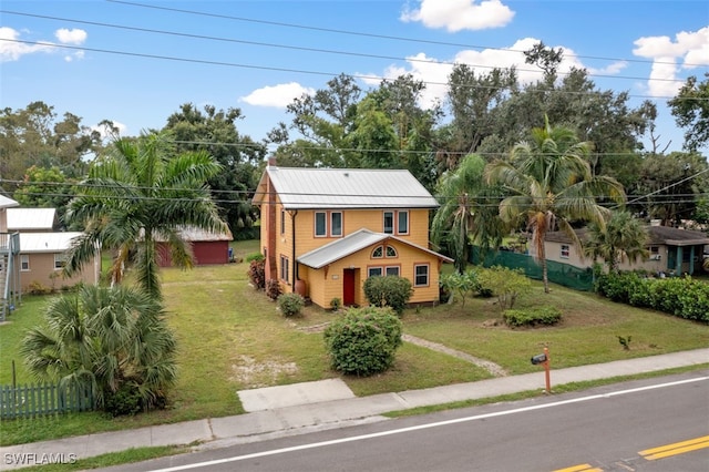 view of front of property with a front lawn