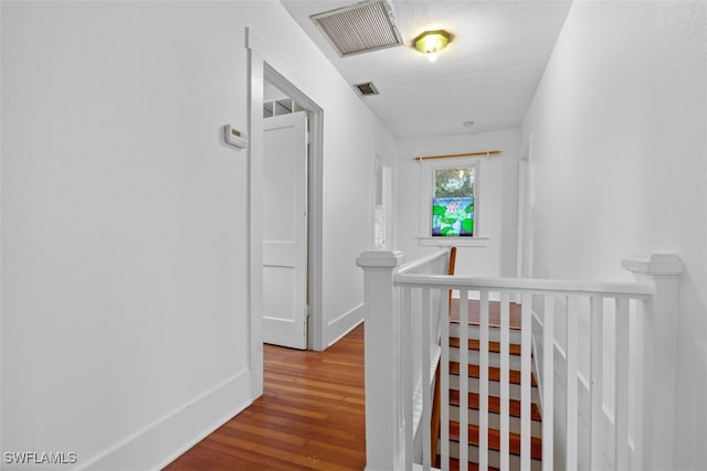 hall featuring wood-type flooring