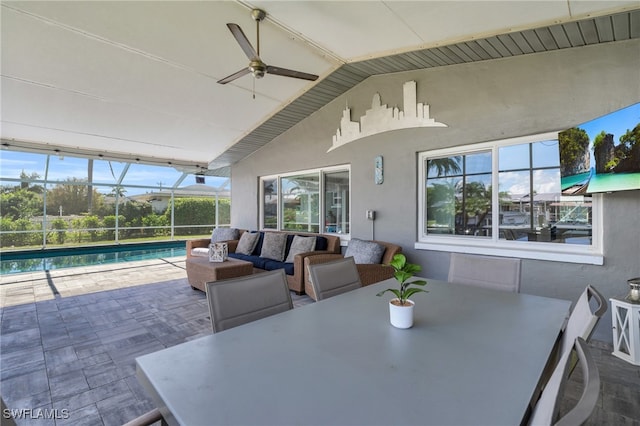 view of patio / terrace featuring an outdoor hangout area, a lanai, and ceiling fan