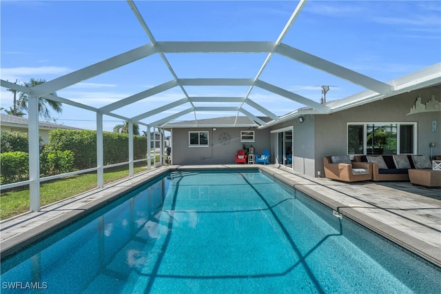 view of pool featuring a patio and a lanai