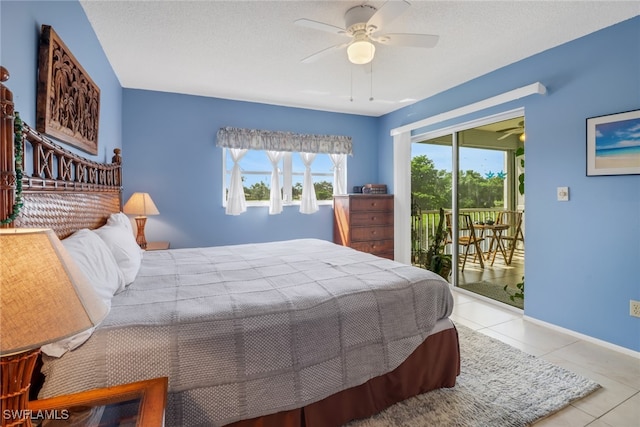 tiled bedroom featuring ceiling fan, a textured ceiling, and access to exterior