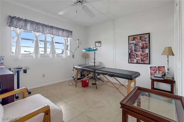 tiled office space with ceiling fan