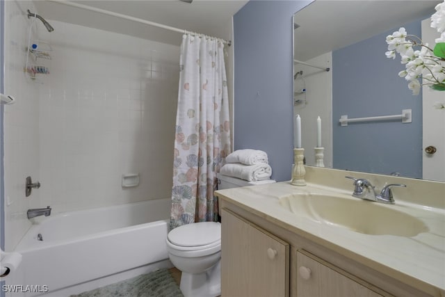 full bathroom with shower / tub combo, vanity, and toilet