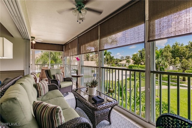 sunroom / solarium with ceiling fan