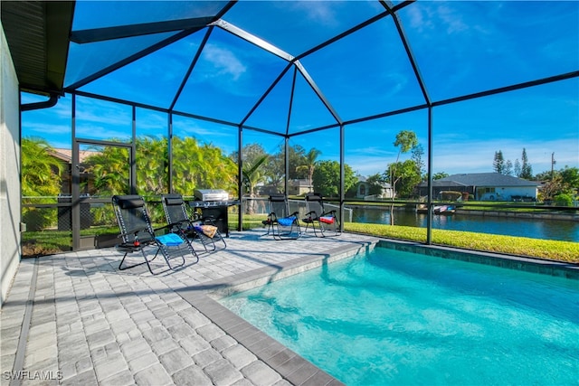 view of pool featuring a lanai, a patio, and a water view