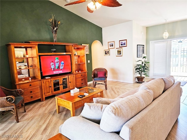 living room with ceiling fan and wood-type flooring