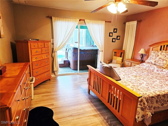 bedroom with ceiling fan, light hardwood / wood-style floors, and access to outside