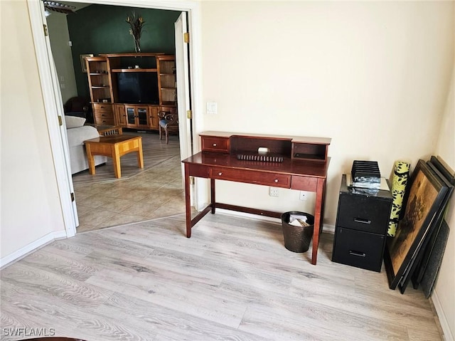 home office featuring light hardwood / wood-style flooring