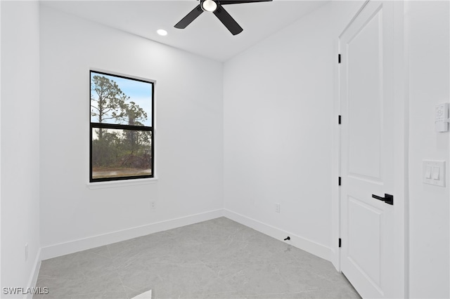 unfurnished room with ceiling fan